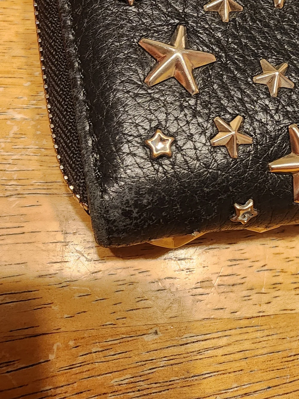 Jimmy Choo Filipa Star Studded Wallet, a black leather zip-around wallet